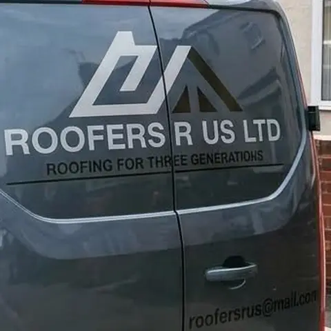 Roofers R Us Ltd logo and strapline on the rear doors of the van